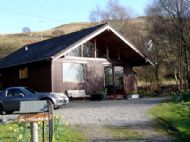 kirkland lodge with loch views and woodburning stove